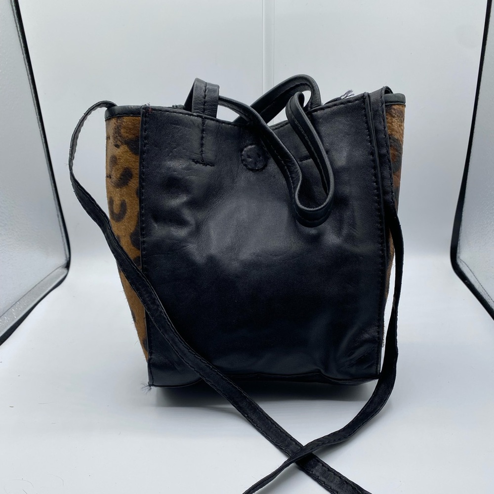 604 Cleobella black leather and calf skin “leopard moss” top & crossbody handles